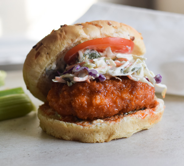 Buffalo chicken burgers with blue cheese slaw